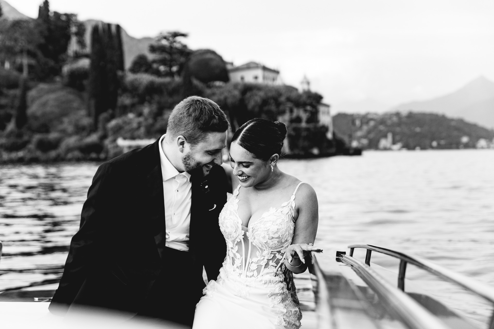 Ryan and Victoria smile together in a boat