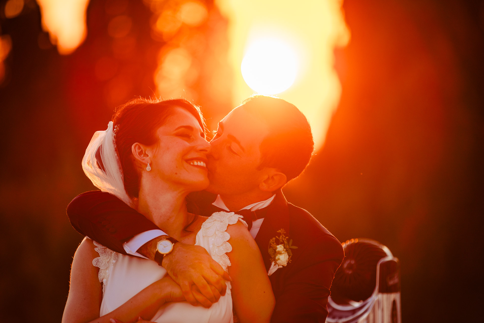 Sara and Giuseppe together at sunset on their wedding day in Rome.