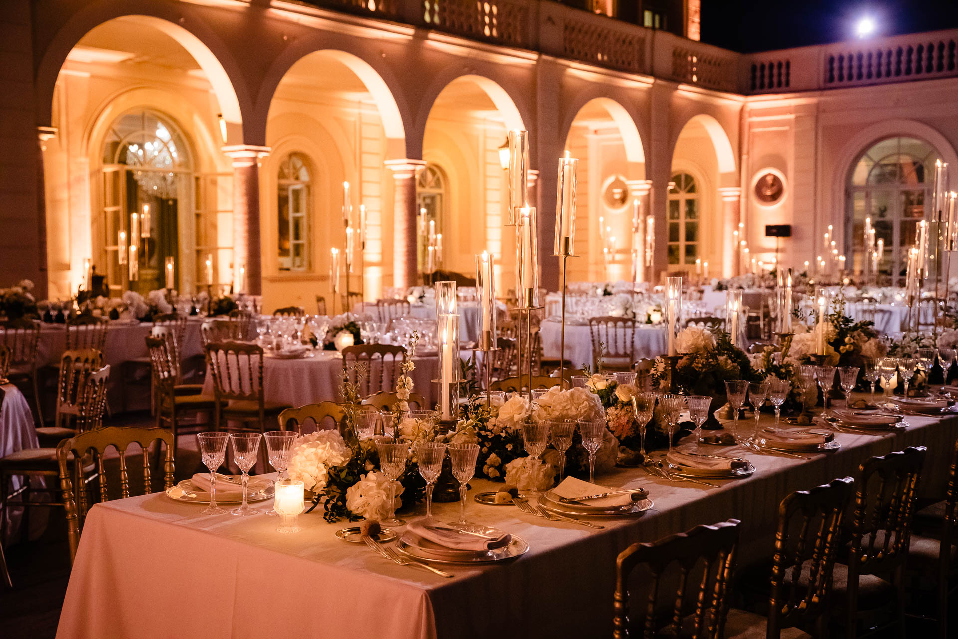 Candlelit reception tables on the terrace at Villa Miani.